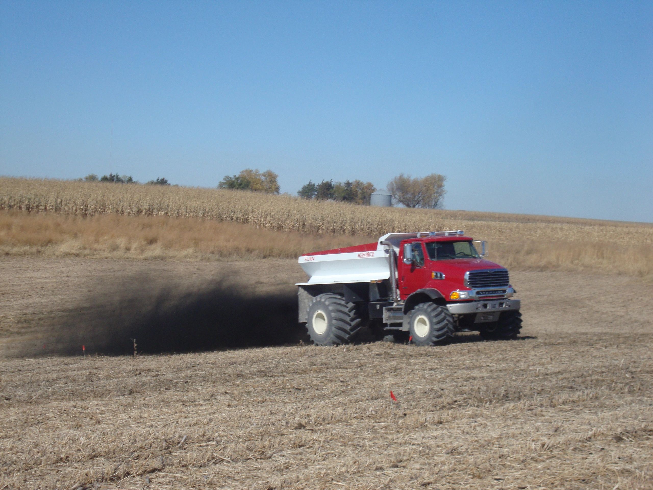 Biochar being applied to a field